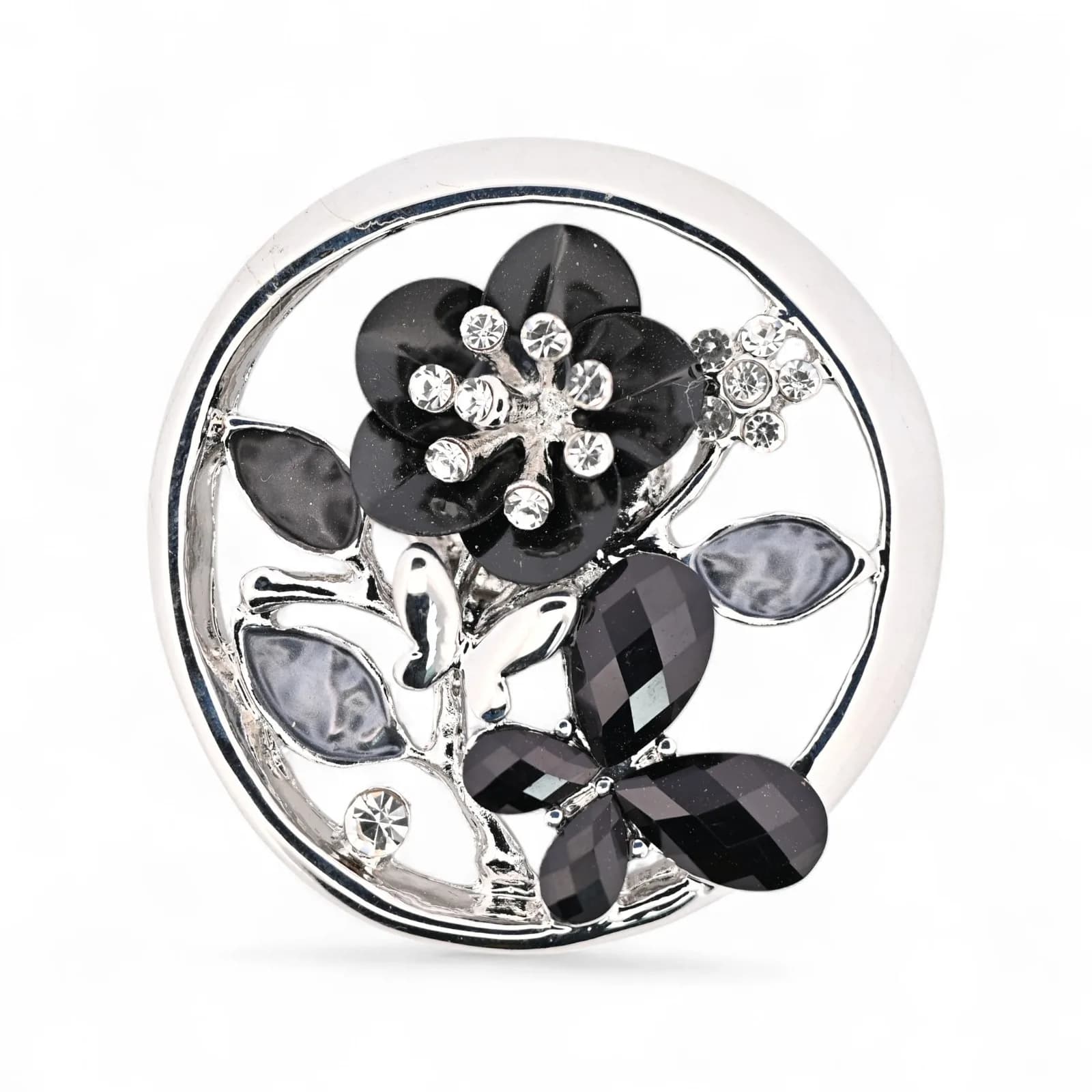 Broche médaillon aimantée noir et argent, fleur et papillon ornés de cristaux en relief